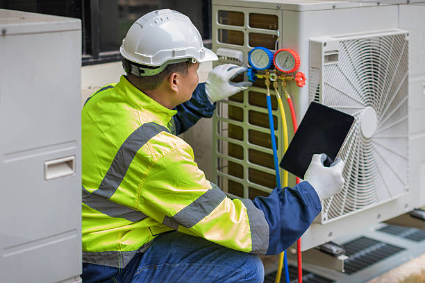 Professional Air Conditioning Repair technician working in Justin, TX